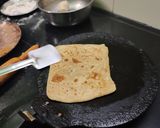 A picture of step 7 of #HBC# Jowar Panner paratha,saag,snake gaurd,banana steam subji.