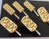 A picture of step 4 of Mango and Passion Fruit Shrikhand Popsicles.