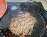 Foto del paso 5 de la receta: Paella de costillas de cerdo y butifarra