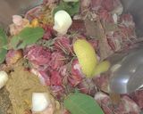 A picture of step 1 of Braised Lamb Shanks with Hummus Moutabal.