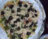 A picture of step 7 of Dynamite cheese loaded fries.