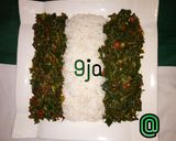 A picture of step 7 of Nigerian rice & greenish sauce.