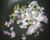 A picture of step 3 of Bombay duck with masala okra.