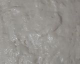 A picture of step 2 of Chicken tikka pizza.