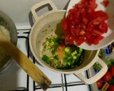 A picture of step 2 of Ugali, Eggs and Greens.