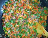 A picture of step 7 of Turmeric fried rice and fried chicken.