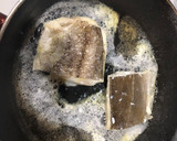 Foto del paso 4 de la receta: Bacalao a la plancha con timbal de ajos tiernos salteados