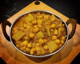 A picture of step 4 of Lauki matar curry.