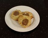 A picture of step 14 of Coconut Cream Thumbprint Shortbread Cookies.