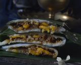 A picture of step 5 of Ela ada with banana filling.