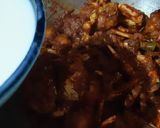 A picture of step 5 of Crab malai curry.