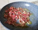 Foto del passaggio 8 della ricetta ROSETTE AL NERO DI SEPPIA CON ZUCCA ALLO  SPECK E MANDORLE