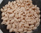 A picture of step 4 of Cowrie/ Kouri (Handmade cowrie shell shaped noodles) in Soup.