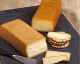 A picture of step 1 of California Farm Cold Smoked Truffle Cheddar Cheese.
