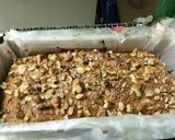 A picture of step 11 of Oats banana walnut tutifuti bread.