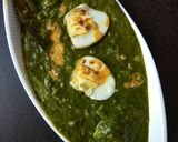 A picture of step 13 of Palak Anda Curry.