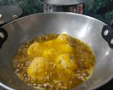 A picture of step 4 of Rice cheese corn balls.