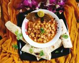 A picture of step 6 of Chickpea curry (chana masala curry).