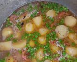 A picture of step 4 of Aloo and Matar pulao.