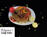A picture of step 9 of Maqlooba rice.
