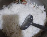 A picture of step 5 of Chicken jalfrezi with vegetable fried rice.