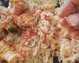 A picture of step 3 of Fried rice with chicken curry.