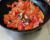 A picture of step 2 of Tomato Garlic Pickle.