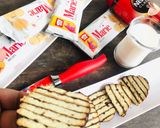 A picture of step 8 of Instant Marie biscuit Cake.