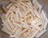 A picture of step 1 of Cheesy and Creamy veggie white sauce penne pasta (with fresh cream, cheese and seasonings).