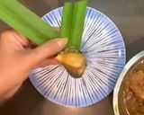 A picture of step 4 of Chicken wrapped in fragrant pandanus leaves. (Pandan Chicken).