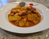 Foto del paso 7 de la receta Guiso de pulpo con langostinos y patatas
