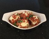 A picture of step 11 of Eggplant Rolled with Ham and Cheese.