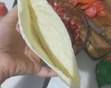A picture of step 4 of Pita bread packet vegetable sandwich.