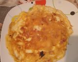 Foto del paso 5 de la receta Tortilla liada de taquitos de jamón y quesitos