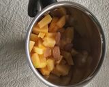 A picture of step 1 of Mango melon smoothie .