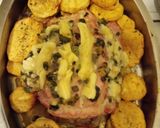 Foto del paso 7 de la receta: Bife de cerdo relleno con verdeo y mozzarella con papas al horno