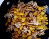 A picture of step 1 of Veg Pasta with Egg and flavoured bacon bits carrot chips + Dip.