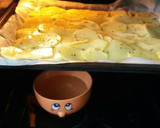 Foto del paso 3 de la receta: Dorada al horno con patatas panaderas y cebollas asadas🐟🐟