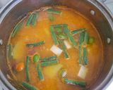 Foto langkah ke 5 dari resep Sayur Asam Merah Daun Melinjo.