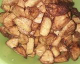 A picture of step 2 of French fries with chicken.
