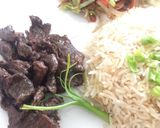 A picture of step 10 of Teppanyaki Beef, Stir Vegetables and Garlic Rice.