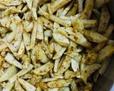 A picture of step 3 of Mixed herbs and Garlic Fries.