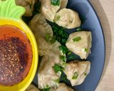 A picture of step 13 of Dumplings served with chilli oil and soya sauce dipping.