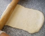 A picture of step 10 of Mini and Cute Cocoa Marble Bread | used two loaf pans.