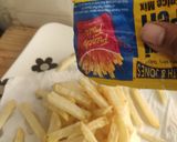A picture of step 4 of Peri peri French fries.