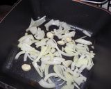 Foto del paso 4 de la receta: Alitas de pollo a los tres ajíes
