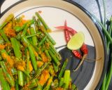 A picture of step 3 of Onion stalk/ Piyajkoli Tawa Fry.