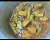 A picture of step 6 of Coconut drumstick curry.