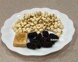 A picture of step 1 of Black Date, Snow Fungus, and Lotus Seed Sweet Soup.