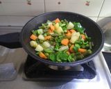 A picture of step 1 of Mix veg curry and garlic lachchha paratha.